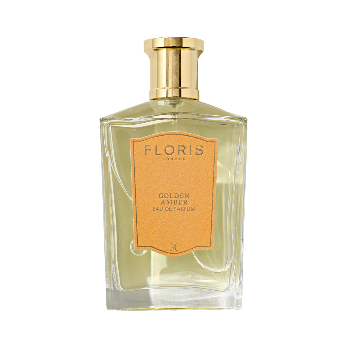 A clear glass bottle of Floris London’s Golden Amber – Eau de Parfum, a floral scent, features a gold cap and peach label on the front.