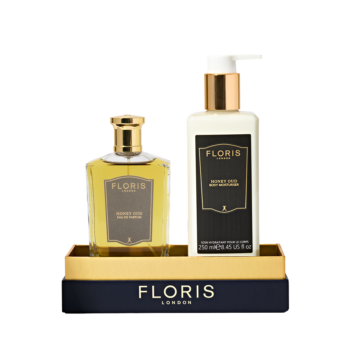 The Sweet Lux | Honey Oud Duo from Floris London EU includes a Honey Oud Eau de Parfum and Body Moisturiser in a gold and black display tray.