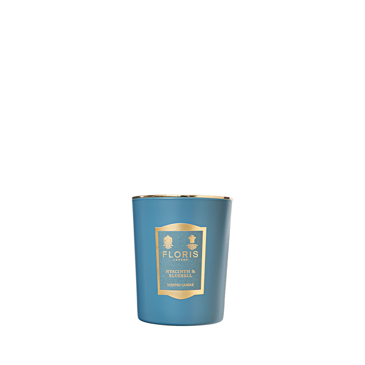 The Floris London Hyacinth & Bluebell Candle is hand poured, features a green floral scent, and comes in a glass holder with a gold label.