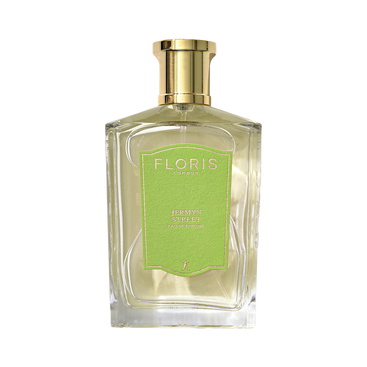 A clear glass bottle of Floris London Jermyn Street - Eau de Parfum, with a gold cap and green label, displayed against a white background.