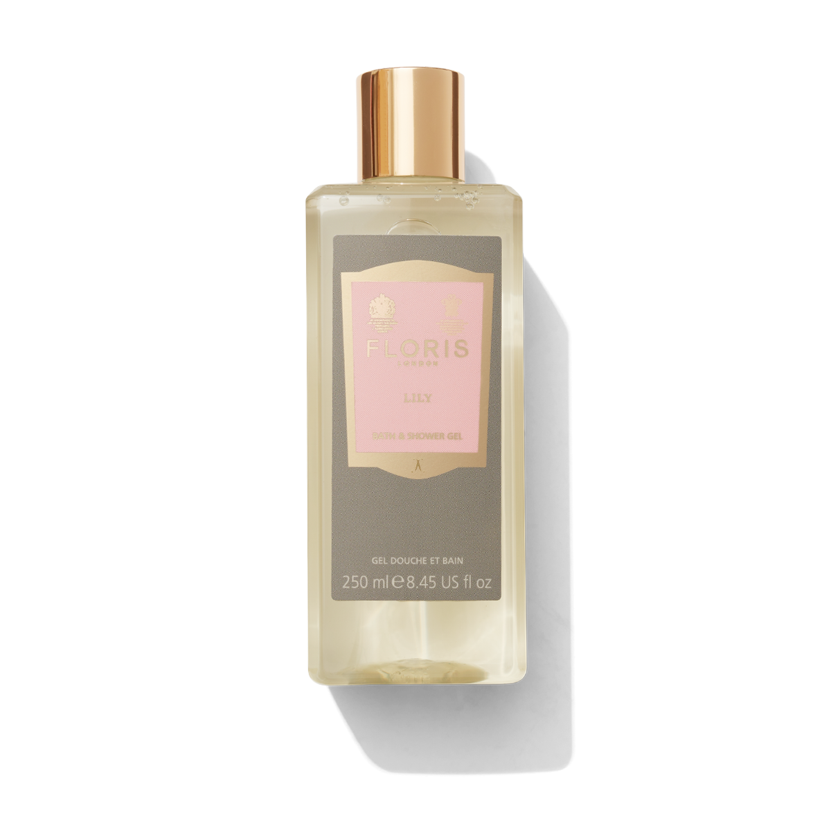 Lily Bath & Shower Gel in clear plastic bottle with light pink and gold label 
