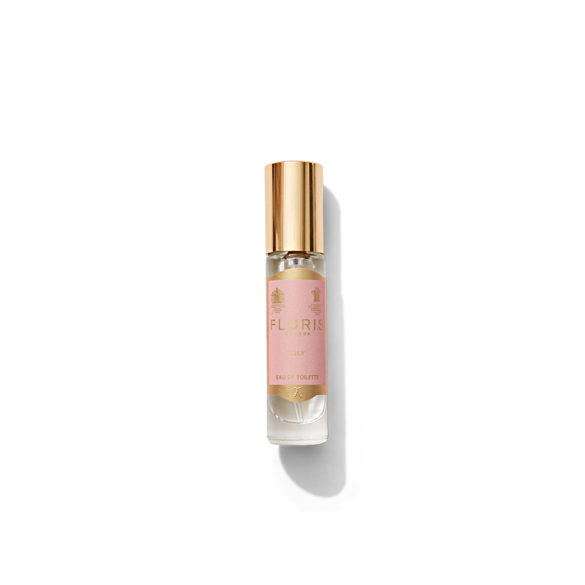 Lily Eau de Toilette in small round glass bottle with light pink and gold label 