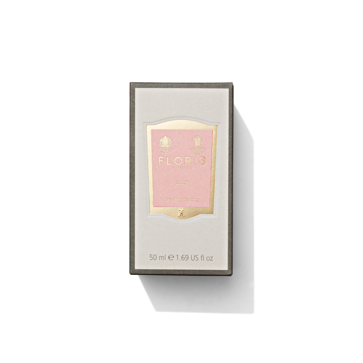 Medium grey box with light pink and gold label containing Lily Eau de Toilette 