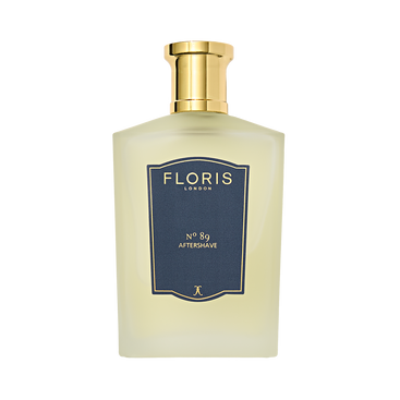 A bottle of Floris London No. 89 Aftershave, featuring a gold cap and blue label, is pictured against a white background.