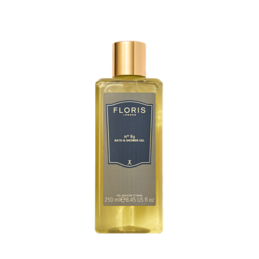A clear plastic bottle of Floris London No. 89 Moisturising Bath & Shower Gel with a gold cap and navy label, featuring the iconic fragrance.