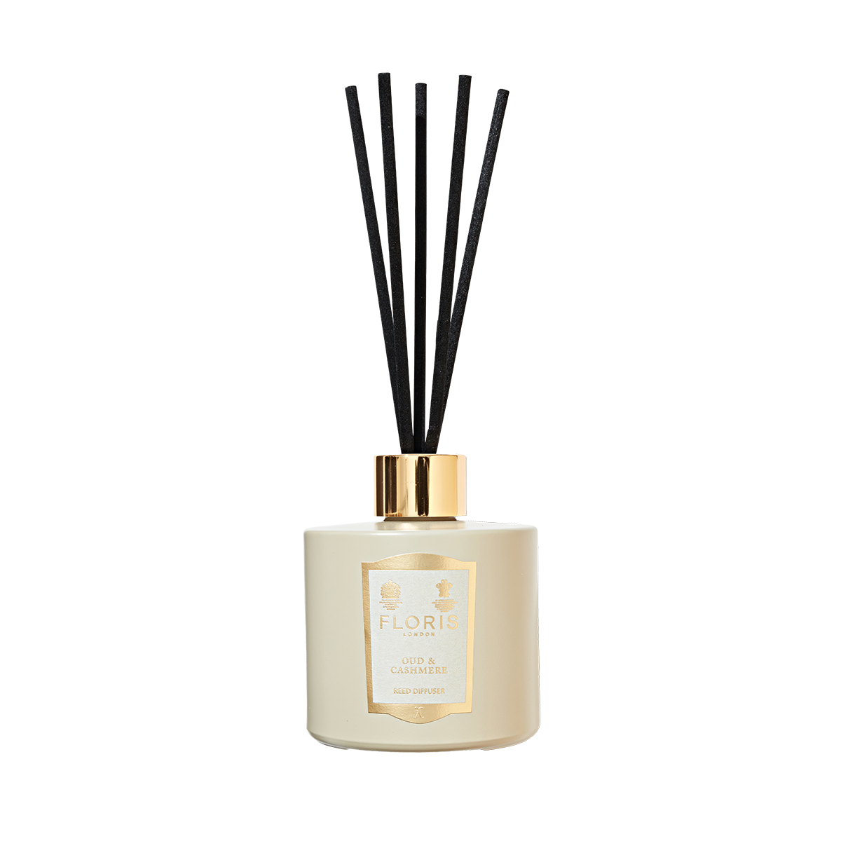 The Floris London Oud & Cashmere Reed Diffuser features six black reeds and a gold label, adding luxurious fragrance to any room.