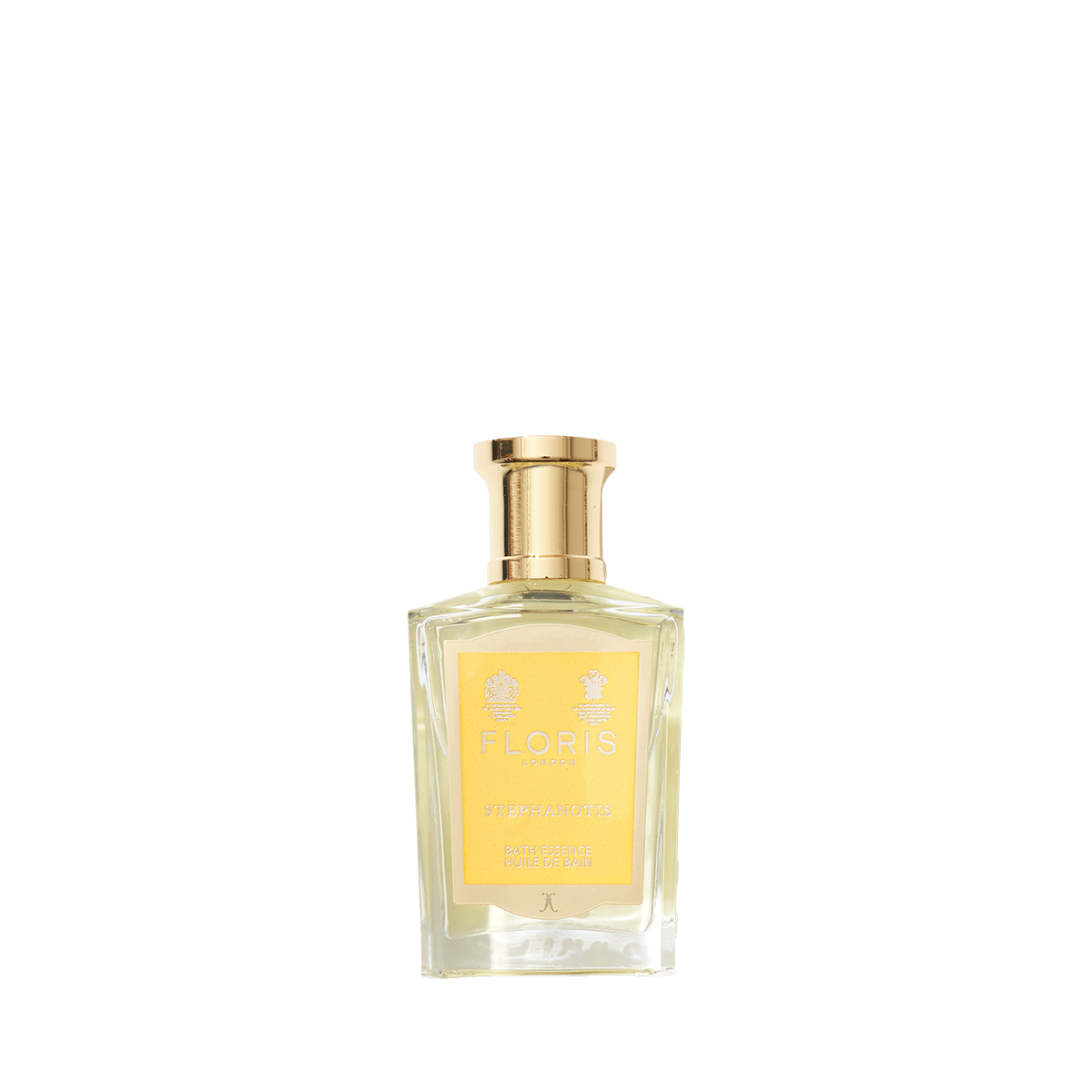 A clear glass bottle of Floris London Stephanotis Bath Essence with a gold cap and yellow label, displayed against a plain white background.