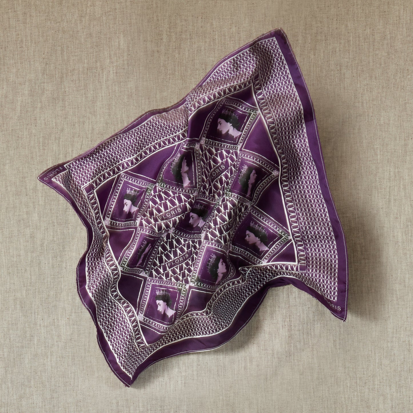 Platinum jubilee purple scarf printed with Her majesty the Queen image and Floris london name.