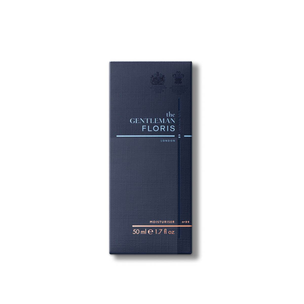 Tall navy blue textured box with light blue Floris logo containing the No. 89 body moisturiser.