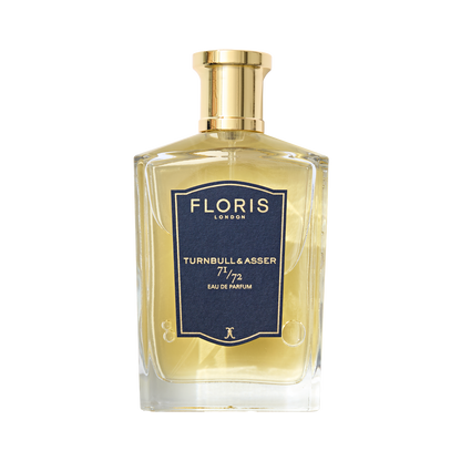 A clear glass bottle of Floris London 71/72 Eau de Parfum, a bespoke fragrance inspired by Jermyn Street and men's fashion.