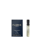 A Floris London 71/72 Eau de Parfum men’s fragrance sample sits next to its dark blue box, inspired by Jermyn Street bespoke fashion.
