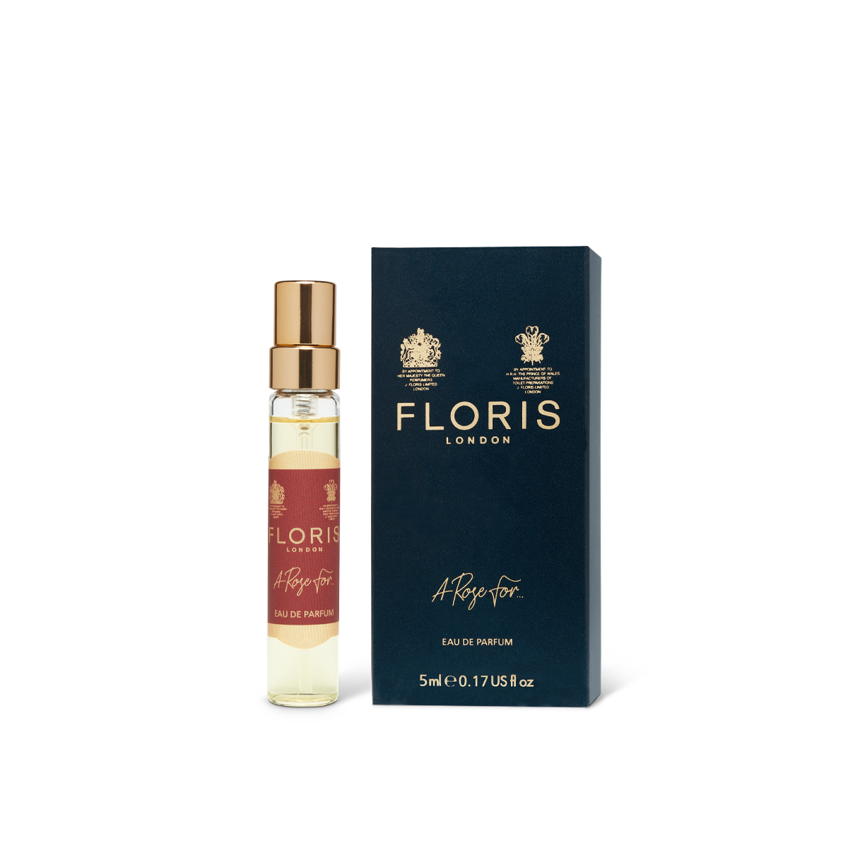 A 5ml perfume bottle labeled "A Rose For..." features a red label and gold cap, positioned next to a dark blue box marked with the brand name "Floris London." This bottle contains an exquisite oud-infused eau de parfum.