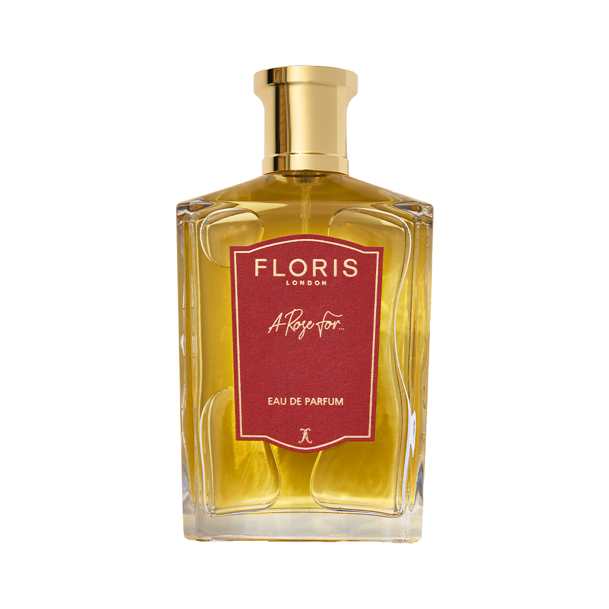 A clear glass bottle of Floris London A Rose For... - Eau de Parfum, an oriental rose scent, with a gold cap and red front label.