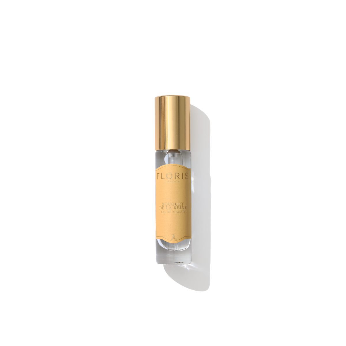 A vertical, cylindrical bottle of Bouquet de La Reine - Eau de Toilette by Floris London features a gold cap and a yellow label, exuding hints of violet leaf. The bottle is positioned against a white background, casting a shadow.