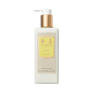 A 250ml Floris London Cefiro Luxury Hand Lotion with pump, gold cap, contains sweet almond oil. Ideal for nourishing dry skin, elegantly in yellow.