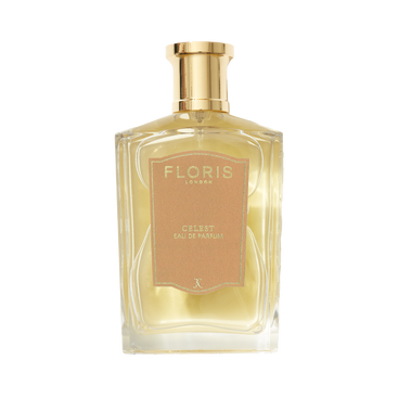 A clear glass bottle of Floris London EU Celest - Eau de Parfum with a gold cap and tan label, filled with light yellow perfume, on a white background.