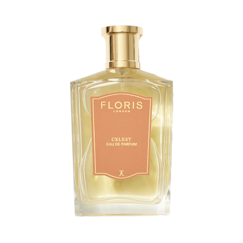 A clear glass bottle of Floris London UK Celest - Eau de Parfum with a gold cap and peach label, filled with light yellow perfume, on a white background.