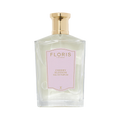 Floris London Cherry Blossom Eau de Parfum in a glass bottle with a gold cap and a pale pink label.