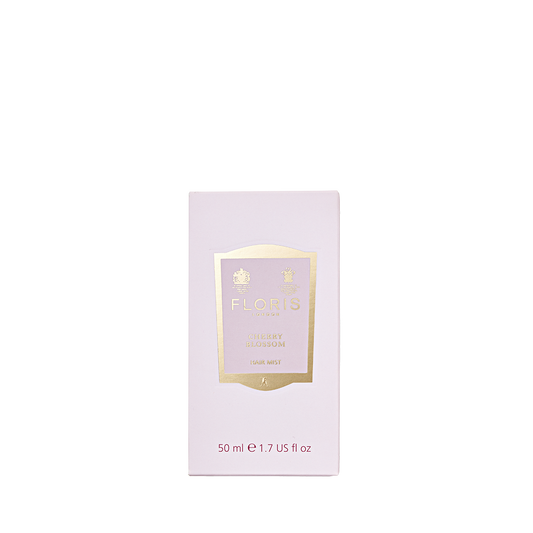 A light pink 50ml Floris London Cherry Blossom Hair Mist box with gold accents—ideal for lasting fragrance and a stylish touch.