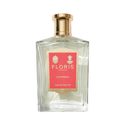 A clear glass bottle of Floris London Chypress - Eau de Toilette, a floral chypre, has a gold cap and a pink front label.