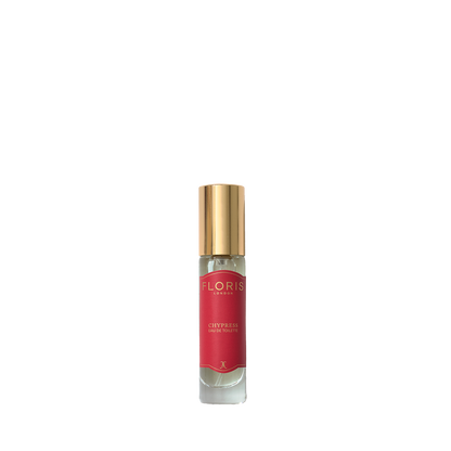 A small Floris London Chypress Eau de Toilette bottle with a gold cap and red label, featuring floral chypre notes, on a white background.
