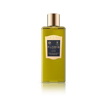 A bottle of Floris London's Elite Bath & Shower Gel, adorned with a golden cap and black label, boasts woody green notes and olive oil for a truly sumptuous bathing experience.