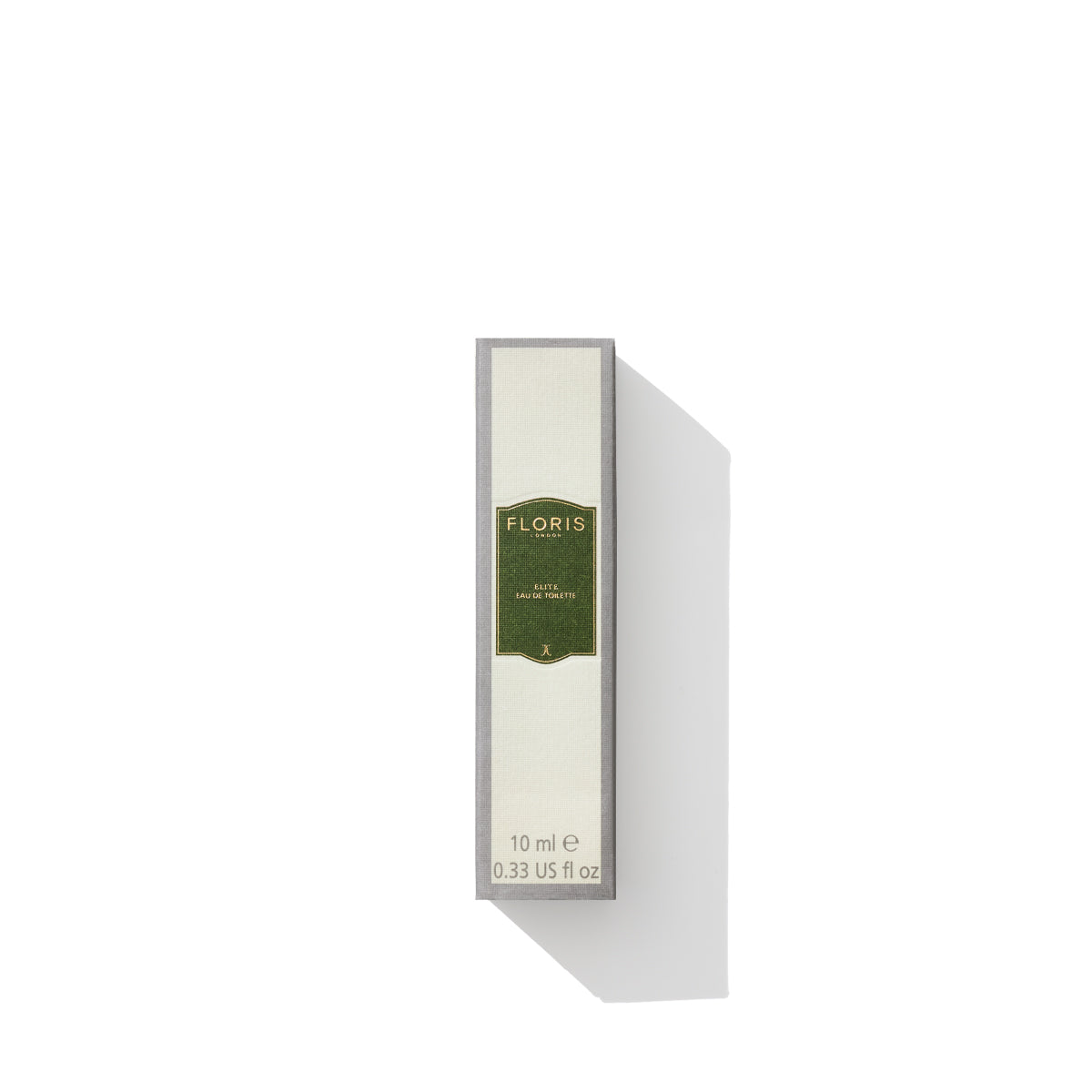 A small rectangular box branded with a green label that reads "Floris London" and "Elite - Eau de Toilette, 0.33 US fl oz." The box casts a shadow on the white background. The packaging suggests a fresh and woody fragrance, promising mossy notes intertwined with a citrus twist.