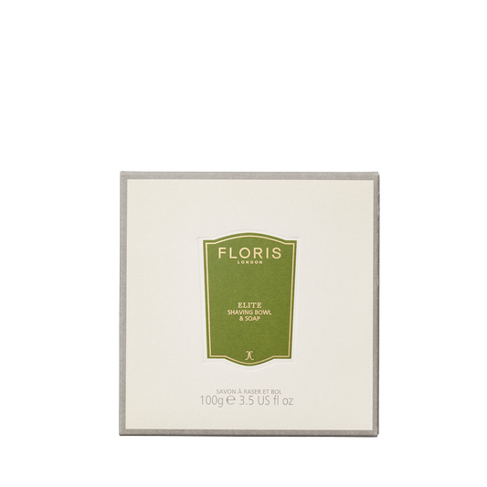 A square box of Floris London Elite - Shaving Soap & Bowl, green label, 100g wooden bowl, shown on a cream background.