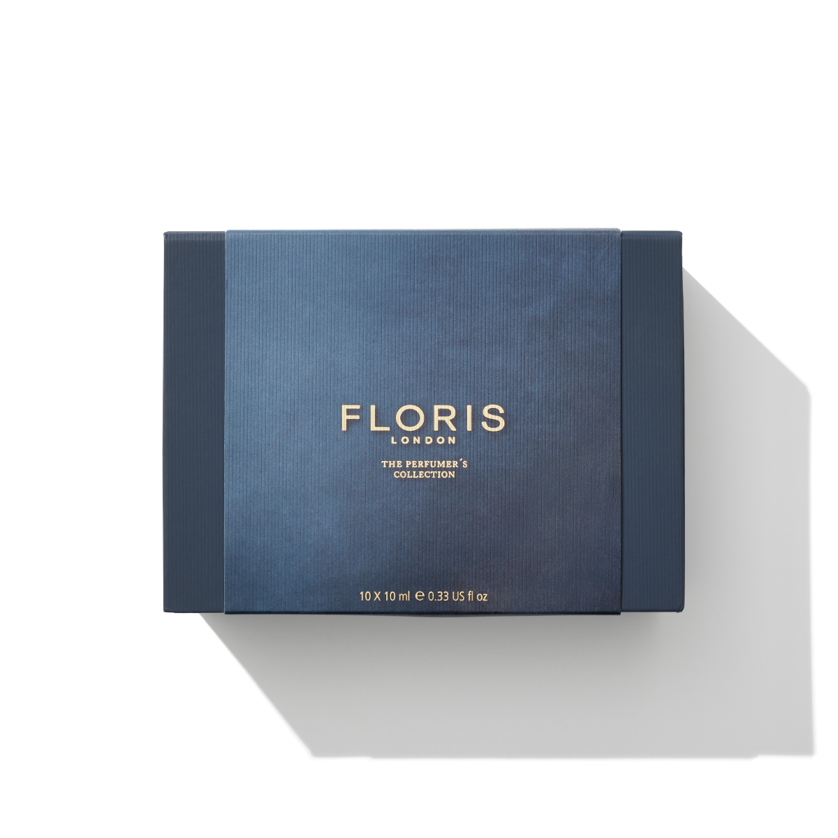 The Perfumer's Collection by Floris London EU, featuring 10 vials of 0.33 fl oz each, comes beautifully packaged in a dark blue box with gold text. This exquisite set is perfect for the perfume connoisseur and makes an exceptional gift.