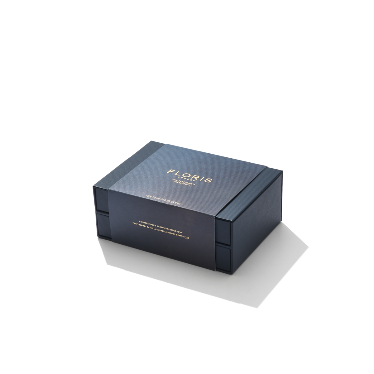 A closed, dark blue rectangular gift box with "Floris London EU" in gold text on the lid, perfect for showcasing 'The Perfumer's Collection,' placed against a white background.