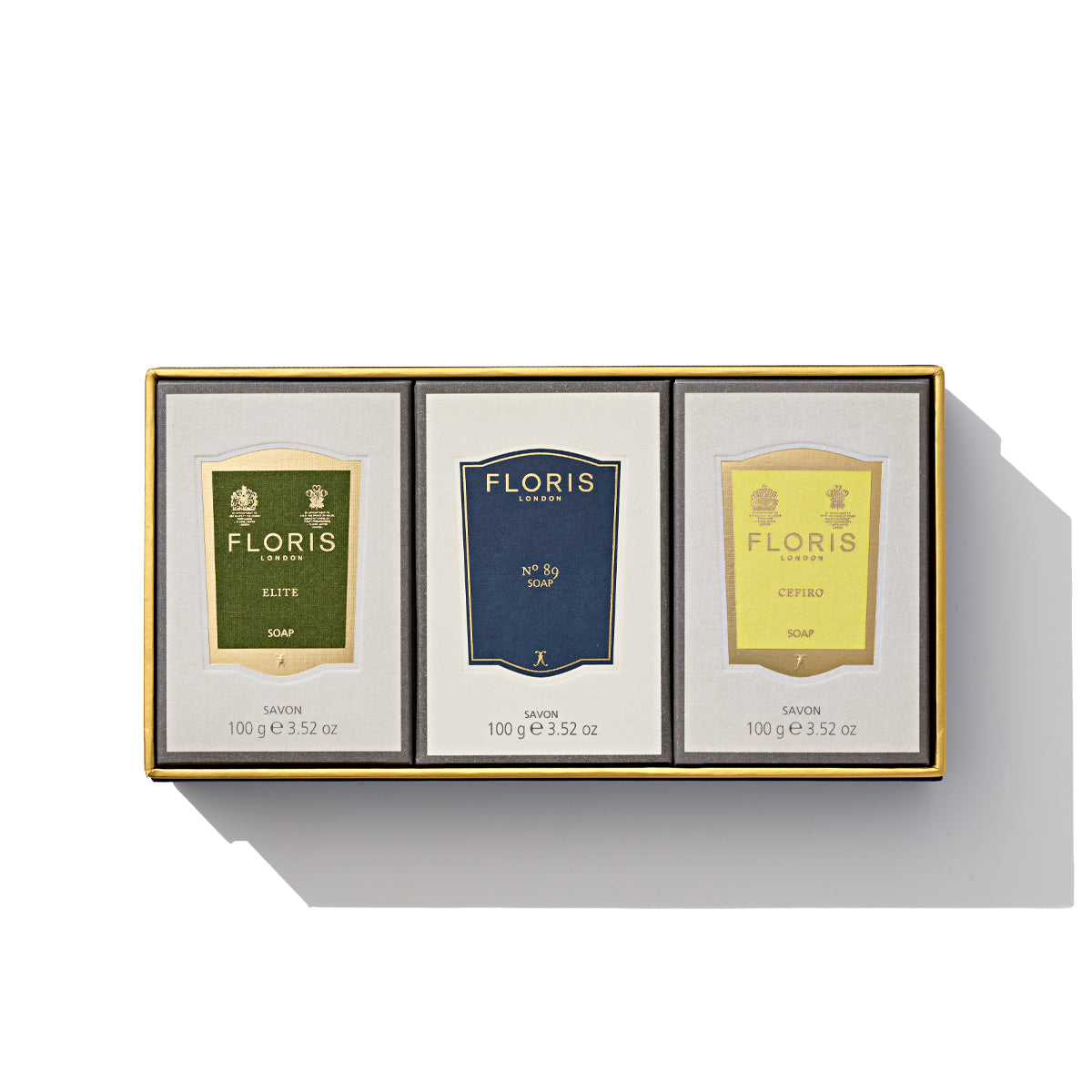 The Floris London Soap Collection | For Him features three elegantly packaged soap boxes, each with its own unique label and color—Lily, Jasmine, and White Rose—beautifully presented in a rectangular box.