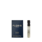A 2 ml vial of Floris London Golden Amber - Eau de Parfum stands next to its dark blue and gold box against a plain white background.