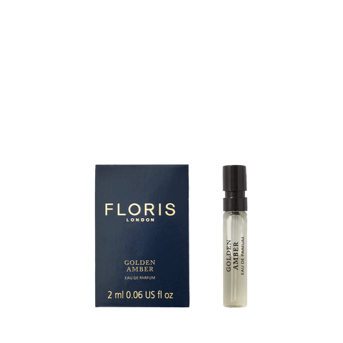 Floris London's 2ml Golden Amber - Eau de Parfum is vegan, comes in a stylish blue box, and features a convenient spray bottle.