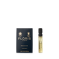 A 2ml spray vial of Floris London Honey Oud - Eau de Parfum rests beside its dark blue and gold box, featuring rich oud oil and English honey.