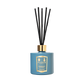 A Hyacinth & Bluebell Reed Diffuser by Floris London, with a blue bottle, gold label and cap, and black reeds, evokes a fresh green floral scent.