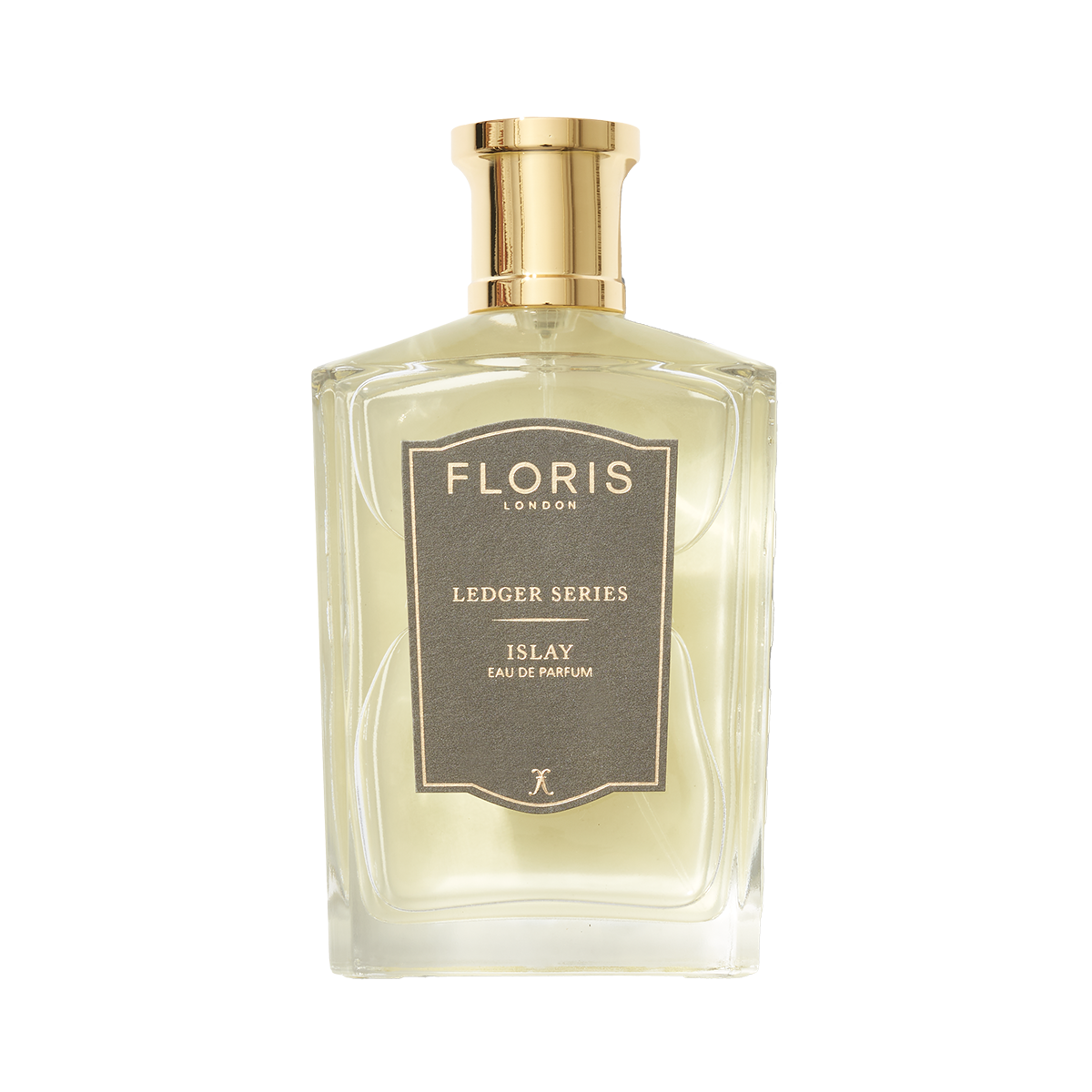 A clear glass bottle with a gold cap labeled "Islay" by Floris London EU, featuring an Islay whisky-inspired fragrance, set against a white background.