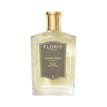 A clear glass bottle with a gold cap labeled "Islay" by Floris London EU, featuring an Islay whisky-inspired fragrance, set against a white background.