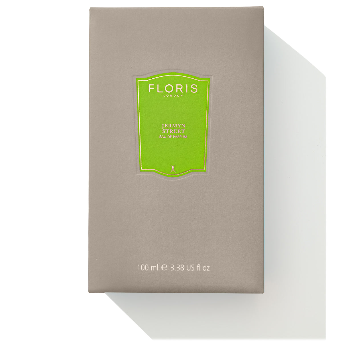 The 100 ml (3.38 US fl oz) rectangular grey box features the Floris London brand name and Jermyn Street - Eau de Parfum in green on the front. This box holds a luxurious fragrance with notes of vetiver, making it perfect for any occasion.