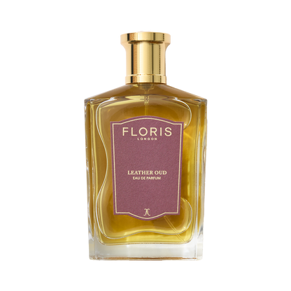 A Floris London Leather Oud - Eau de Parfum glass bottle with a gold cap and purple label, photographed against a plain white background.