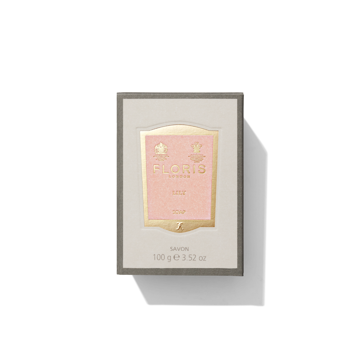 Small grey box with light pink and gold label containing Lily Luxury Soap