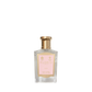 Floris London EU Lily - Bath Essence in a clear glass bottle with gold cap and pink label, featuring a delicate floral green scent, set on white.