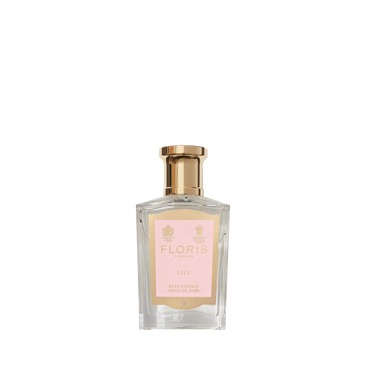 Floris London EU Lily - Bath Essence in a clear glass bottle with gold cap and pink label, featuring a delicate floral green scent, set on white.