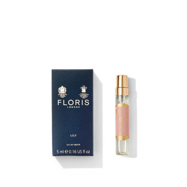 Floris London's Lily - Eau de Toilette, 5 ml bottle next to its box, is set against a dark background with gold highlights.