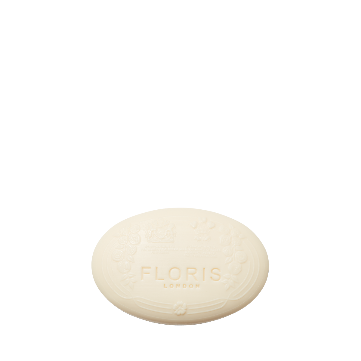 Oval-shaped white Lily - Luxury Soap by Floris London, embossed with the brand name and decorative patterns on its vegetable base.
