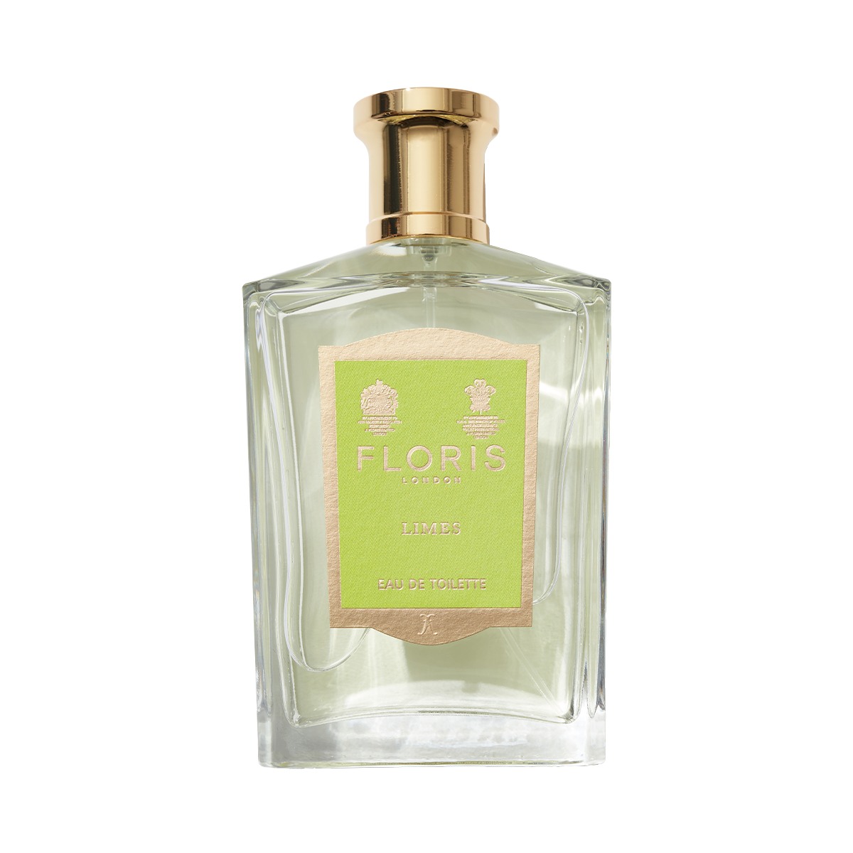 A bottle of Floris London's Limes Eau de Toilette has a gold cap and green label, offering vibrant citrus fragrance with hints of lemon zest.