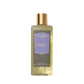 A clear 250ml Floris London Night Scented Jasmine Moisturising Bath & Shower Gel with a gold cap and purple label, featuring a floral scent.