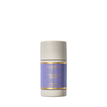 A 75ml cylindrical stick of Floris London EU Night Scented Jasmine Deodorant Stick, aluminium-free with a beige cap and purple-gold label.