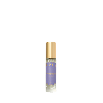 A small glass bottle of Floris London Night Scented Jasmine Eau de Toilette, with a gold cap and white label, rests against a plain white background.