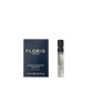 A 2 ml Night Scented Jasmine - Eau de Toilette vial by Floris London rests by its navy and gold box, evoking white jasmine and Mediterranean blooms.