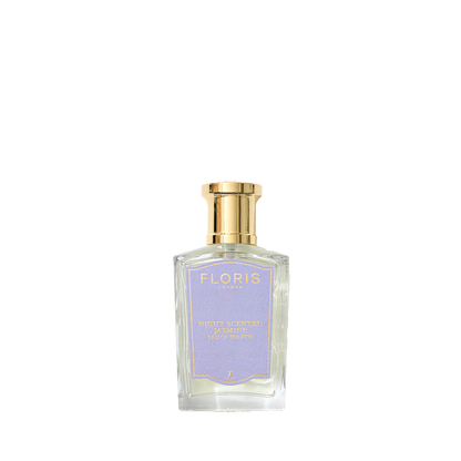 A clear glass bottle of Floris London Night Scented Jasmine Eau de Toilette, with a seductive Mediterranean floral scent, against a plain white background.